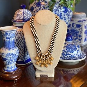 Black/white and gold statement necklace.